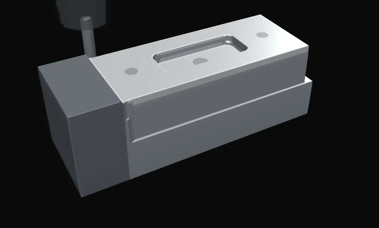 CAMstein simulation of a manifold block on a 4th axis, with the end mill finishing the pocket